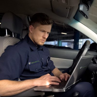 Security-Guard-Mobile-Patrol Security Guard in Patrol Vehicle