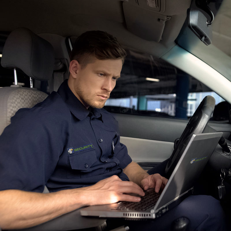 Security-Guard-Mobile-Patrol Security Guard in Patrol Vehicle